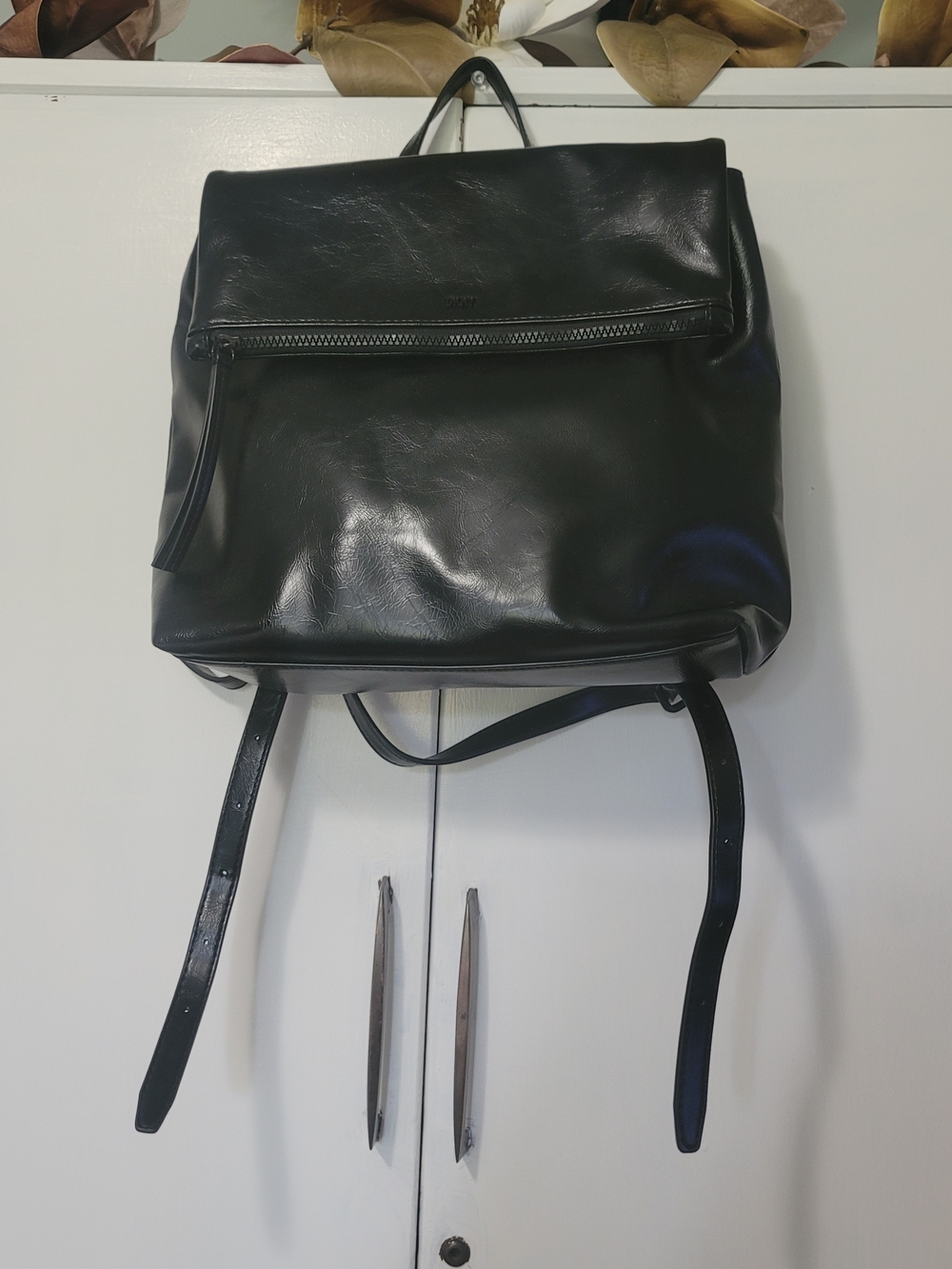 DKNY Black Patent Leather Flap Backpack with Front Zip